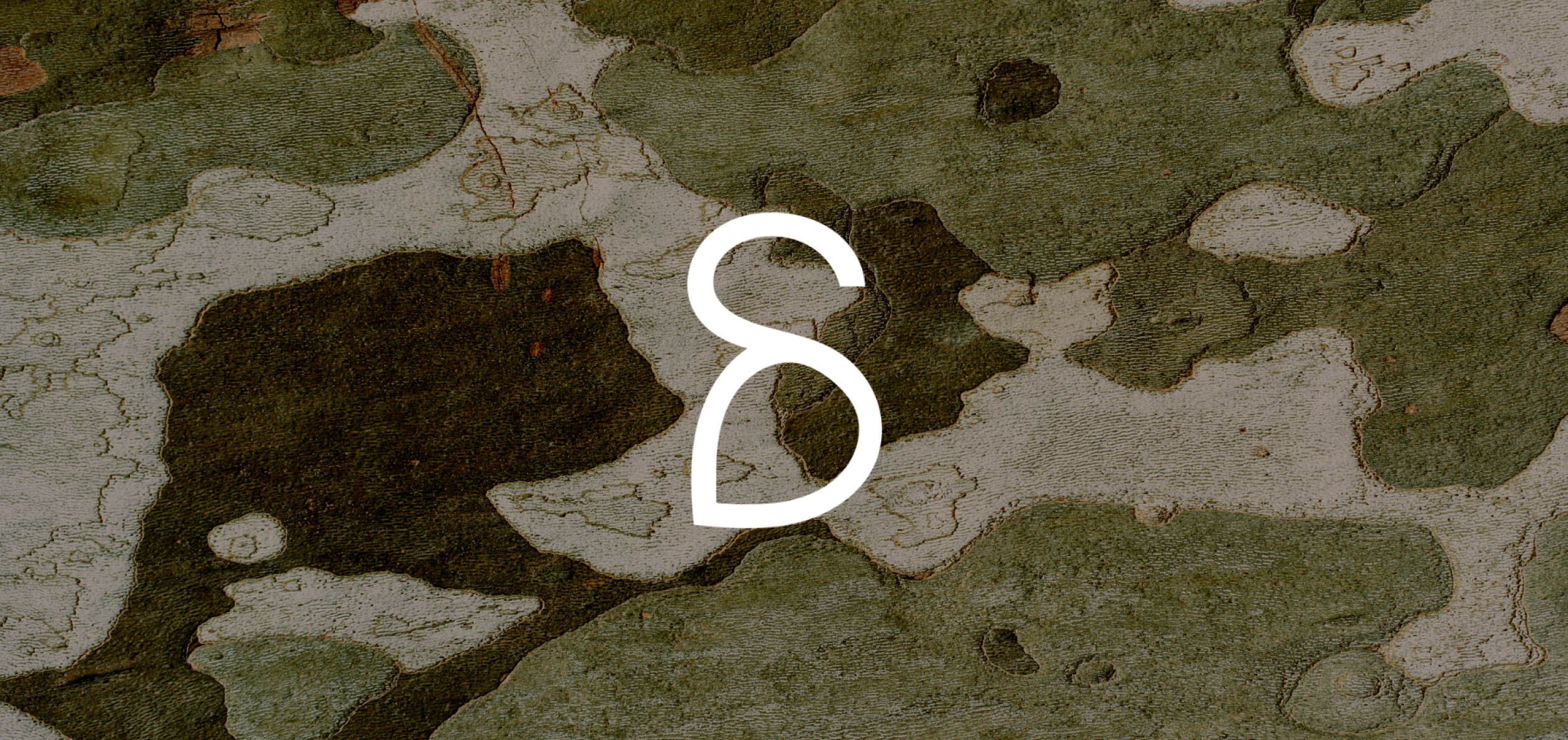 Anders brand wordmark in white placed on top of an image of a modern interior design.